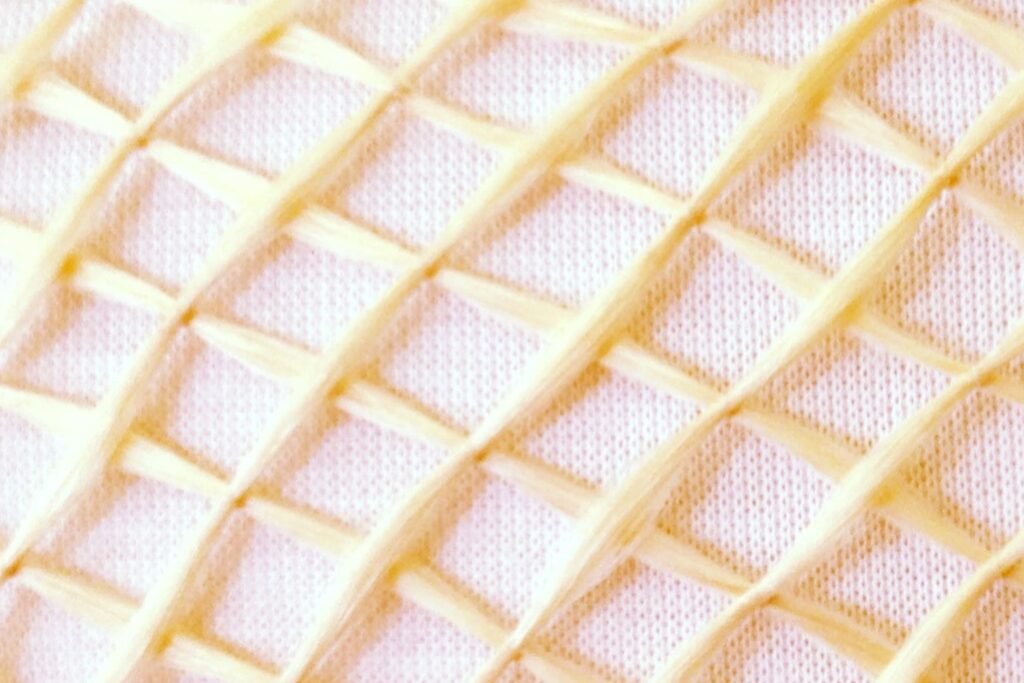 Closeup of a grid of hair stitched together for a TRESemmé commercial